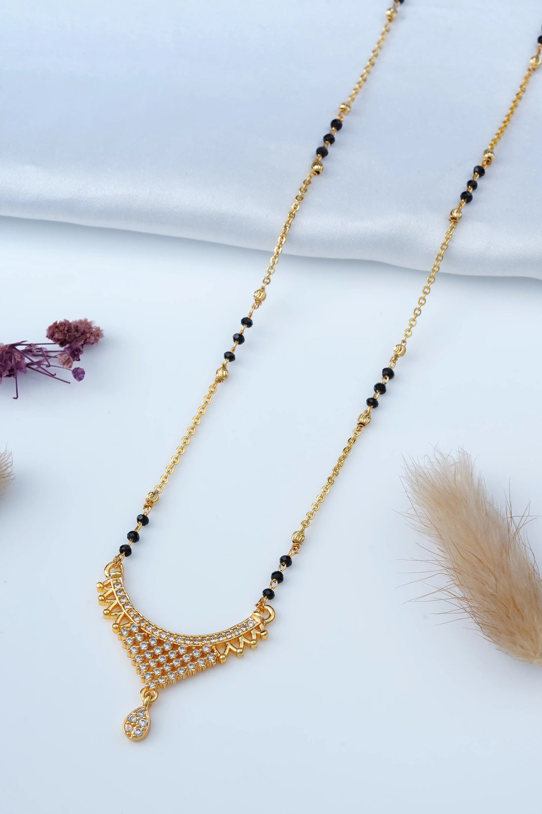 TooBela gold tone crystal mangalsutra necklace with black bead chain