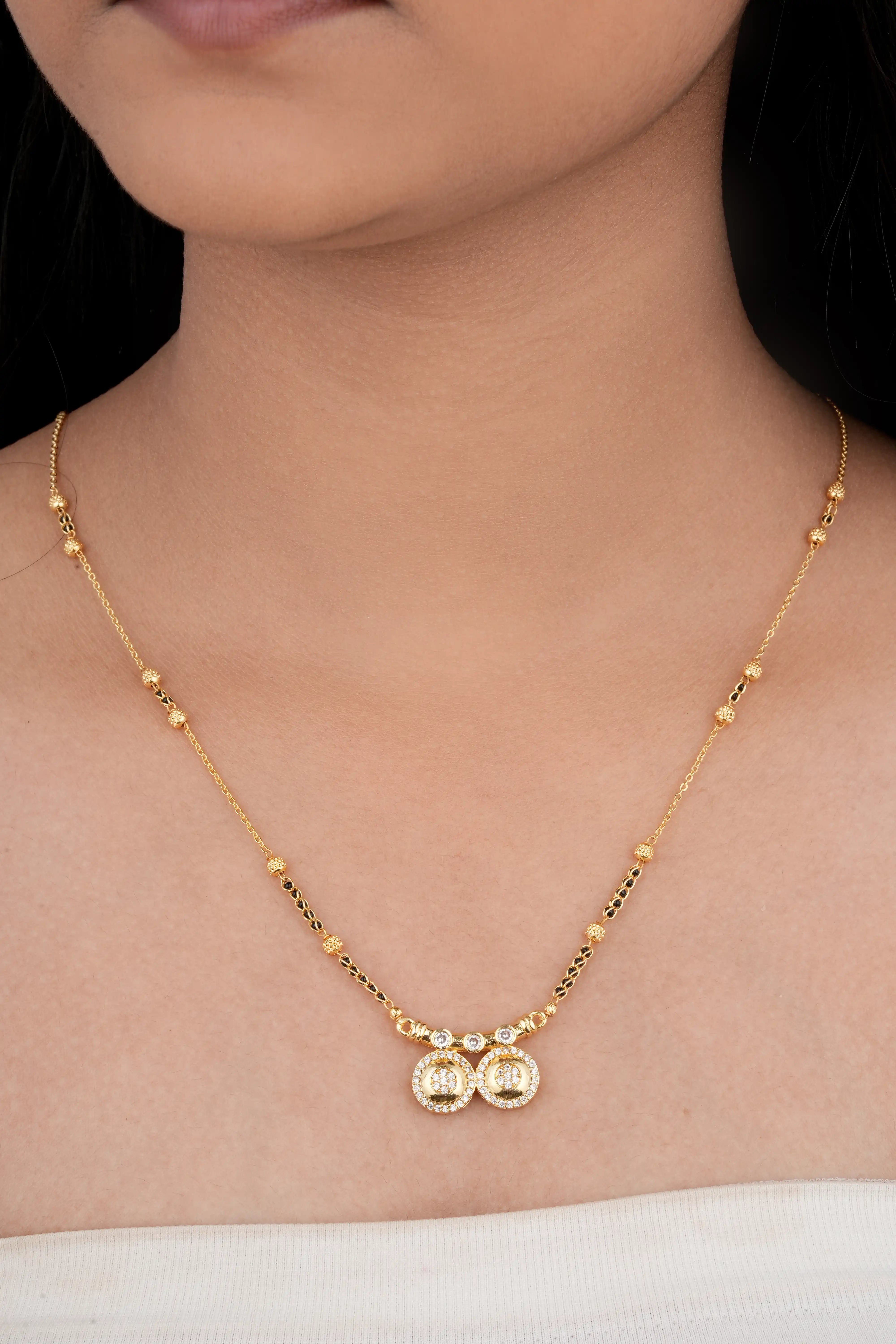 Close up of TooBela CZ studded double circle mangalsutra pendant